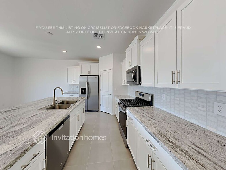 Building Photo - 40471 W Sunland Dr