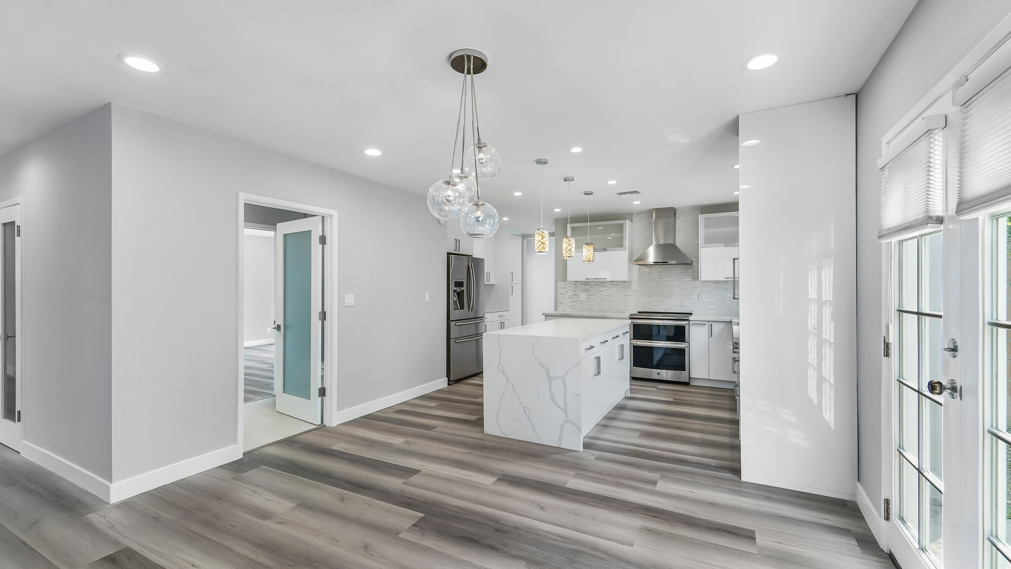 Open Kitchen with Waterfall Island - 5902 Blairstone Dr