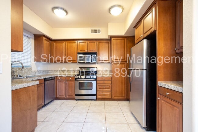 Building Photo - Elegant Westside Condo with Modern Upgrades and Private Patios