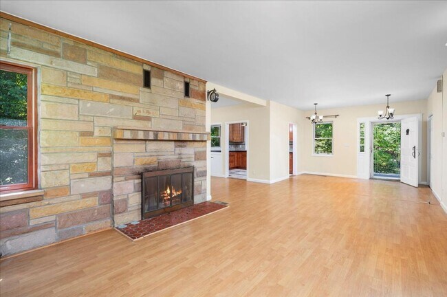 Building Photo - Elegant Multi-Level Brick Residence with Outdoor Oasis