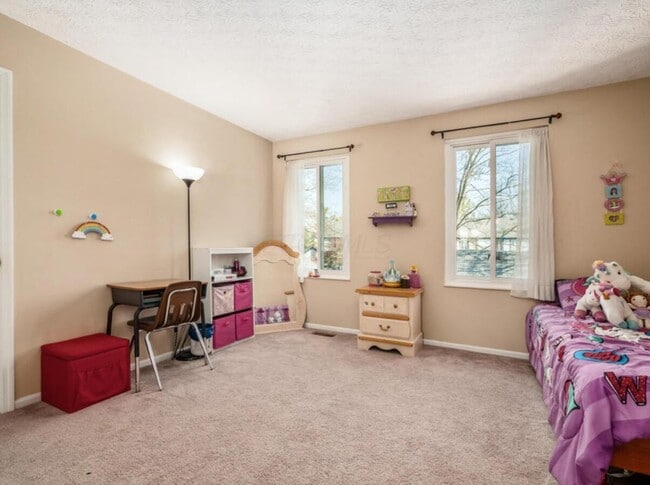 Building Photo - 6985 Muirfield Dr