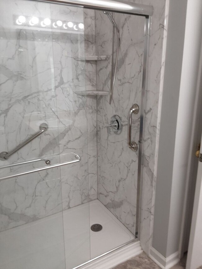 Building Photo - 1/2 off First Month Rent home has new flooring throughout.