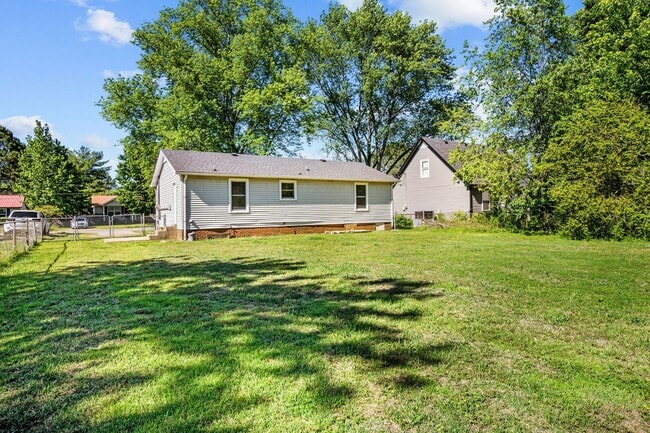 Building Photo - Spacious Yard + Fresh Interior Updates!
