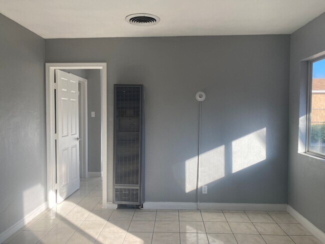 Building Photo - Hard to Find 1 BD 1 BA House with a 2 car garage and it's own yard.