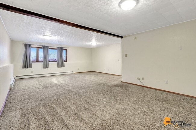 Building Photo - Spacious Home with Garage & Fenced Yard Near JBER & Major Hospitals