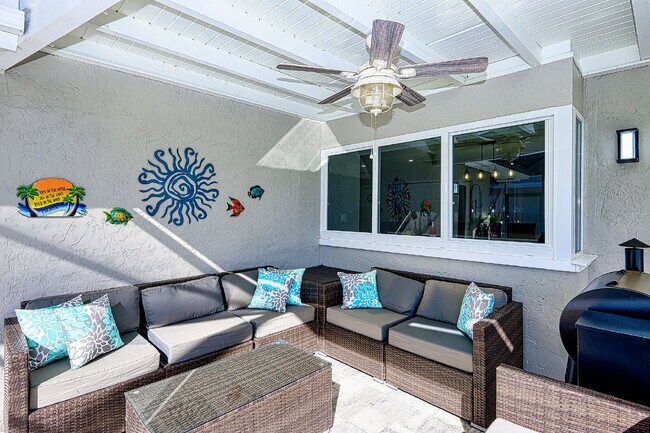 Building Photo - Waterfront Furnished Pool Home with Gulf & Canal Views in Estero Bay Shores