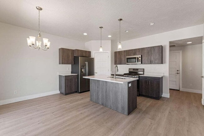 Building Photo - "Spacious 3-Bedroom Townhouse Retreat with...