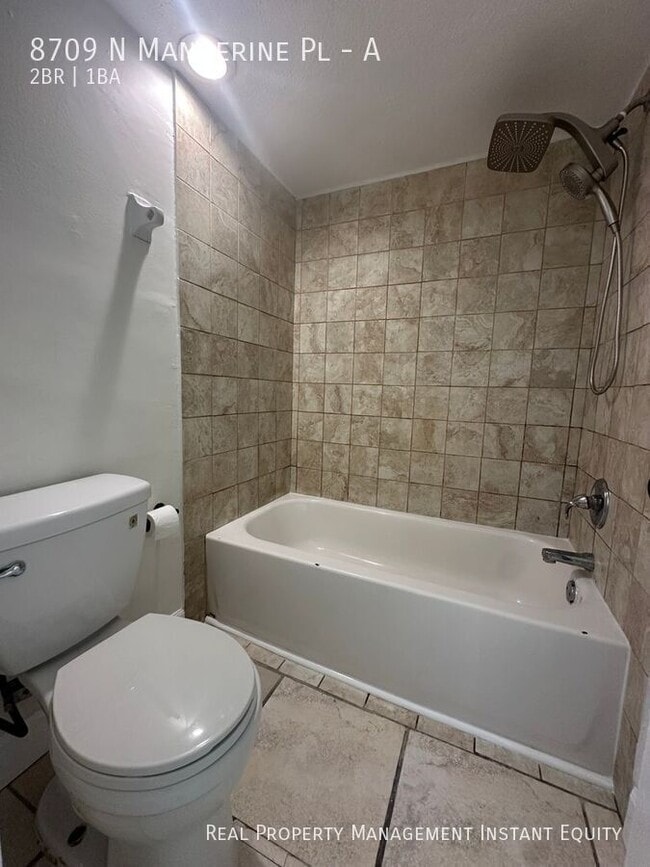 Building Photo - 8709 N Mandarine Pl