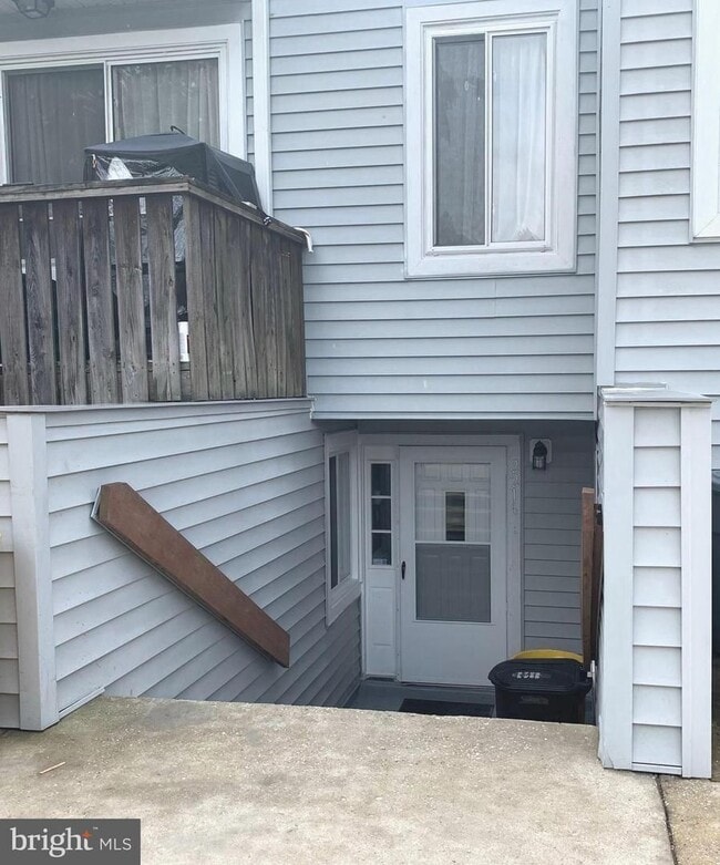 Building Photo - Beautifully updated 2 bd 1 bth patio level condo backing to open area.