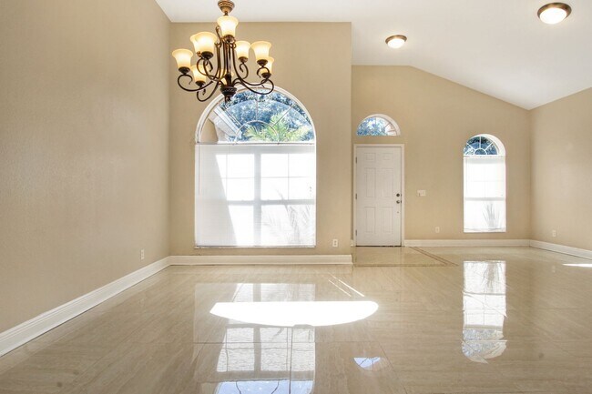 Building Photo - Move-In Ready Home with Open Layout and Op...