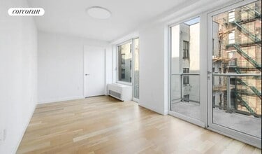 Building Photo - 111 E 115th St