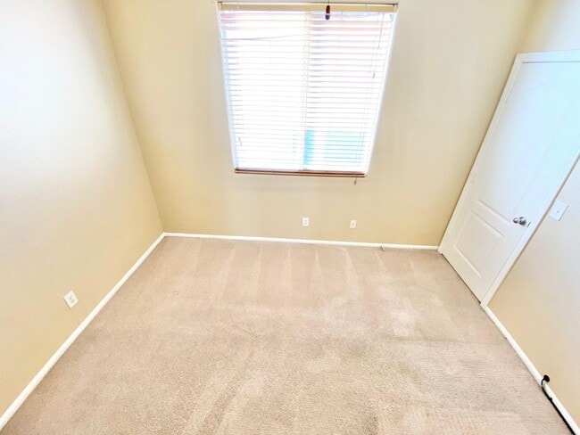 Building Photo - THIS SPACIOUS RESIDENCE FEATURES 4 BEDROOM...