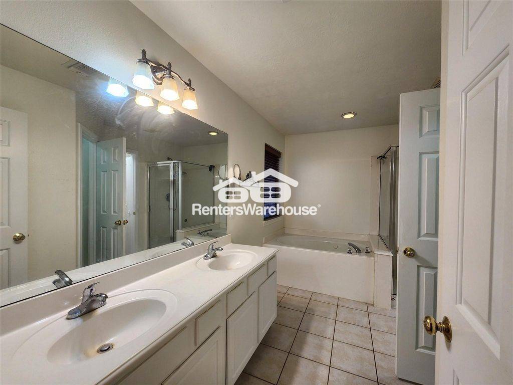 Building Photo - 24422 Travis House Ln