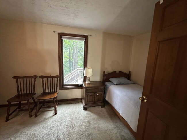 Building Photo - Peaceful Waterfront Living: 2-Story Home on River Road with Ample Outdoor Storage & Water Extras!