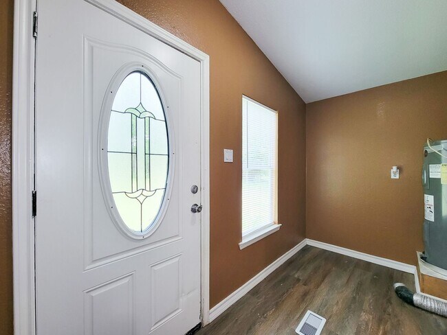 Building Photo - Experience the perfect blend of space, comfort, and country living with this charming 3-bedroom, ...
