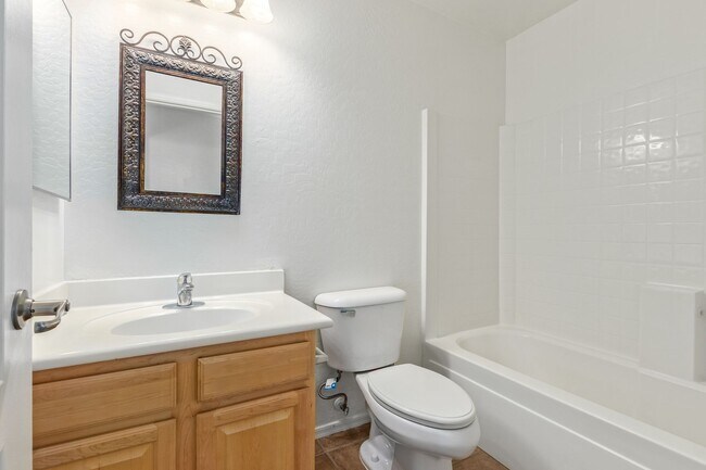 Building Photo - 4-Bed, 3-Bath Home with Versatile Layout a...