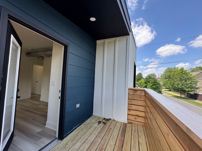 Building Photo - Vaulted Ceilings & Hardwood Floors in This Charming Indianapolis L