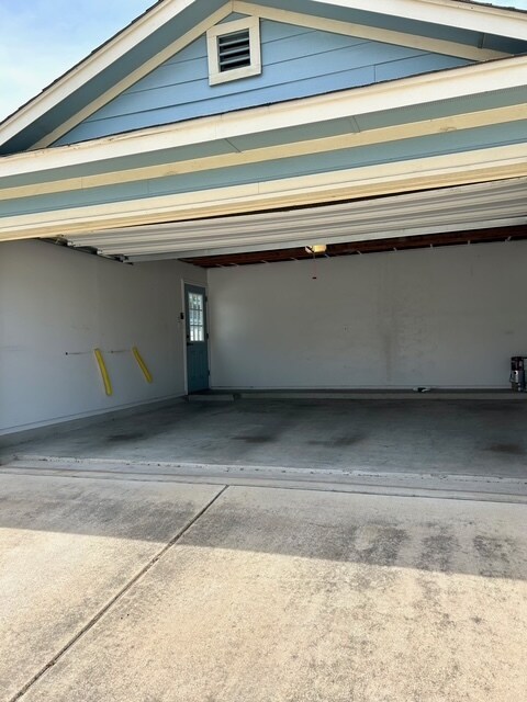 Two car garage with overhead storage - 1702 Sand Hills Dr