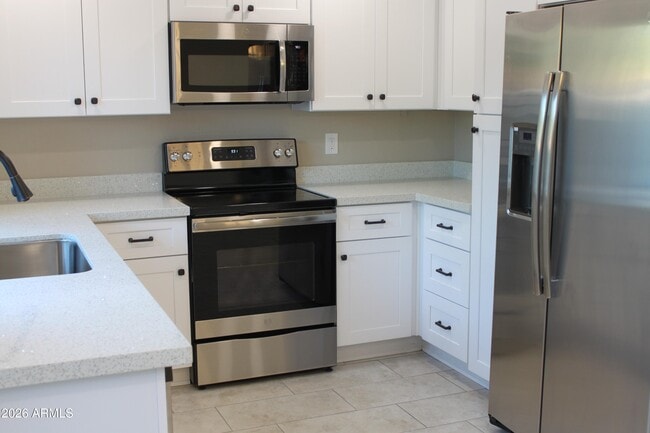 Building Photo - 1550 N Stapley Dr
