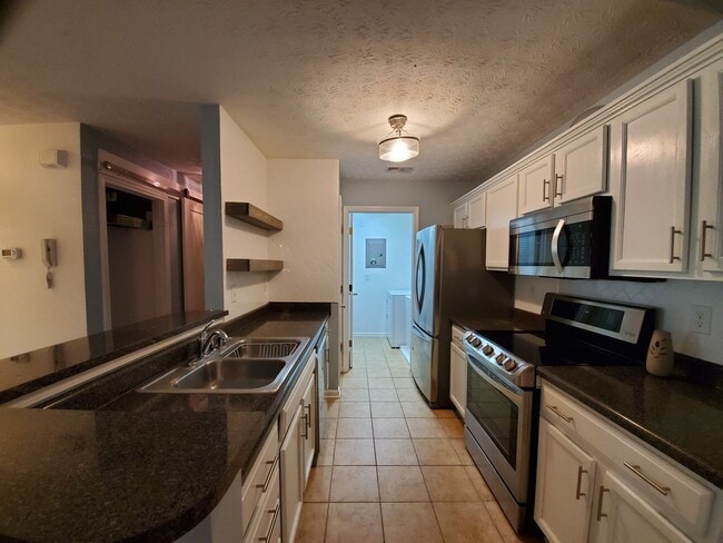 Building Photo - CHECK OUT THIS STUNNER!!  Beautifully Upda...