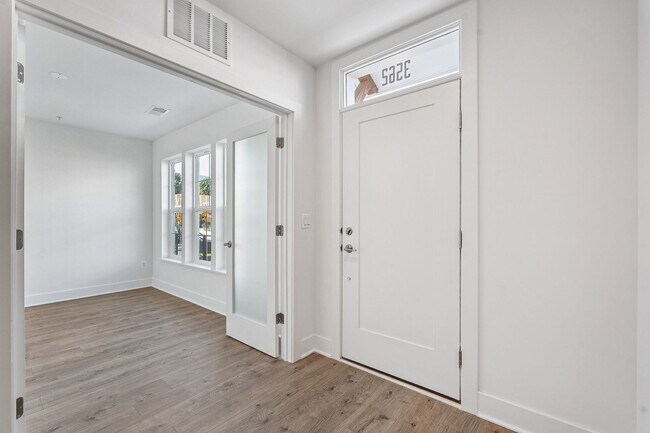 Building Photo - Brand New 4 Bedroom, 3.5 Bath Townhome in ...
