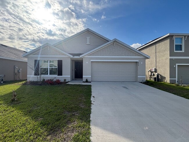 Building Photo - Spacious 4/2 In Gate Community W/ Amenities