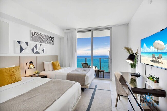 Building Photo - 4010 S Ocean Dr