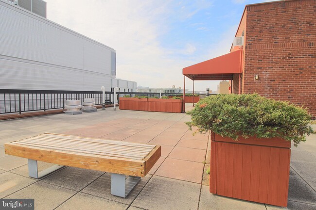 Building Photo - 1140 23rd Street NW Unit 105