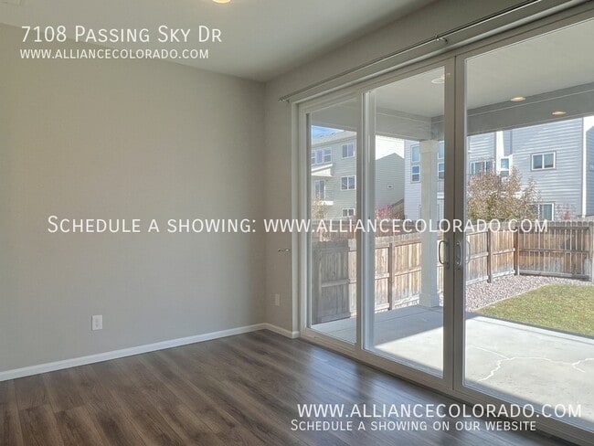 Building Photo - 7108 Passing Sky Dr