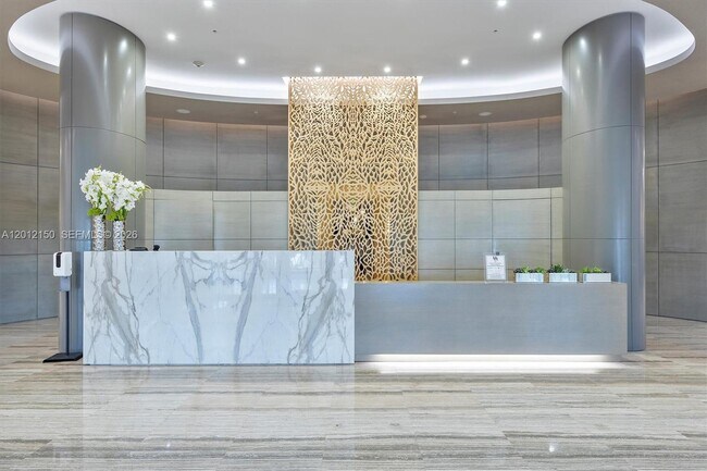 Building Photo - 10275 Collins Ave