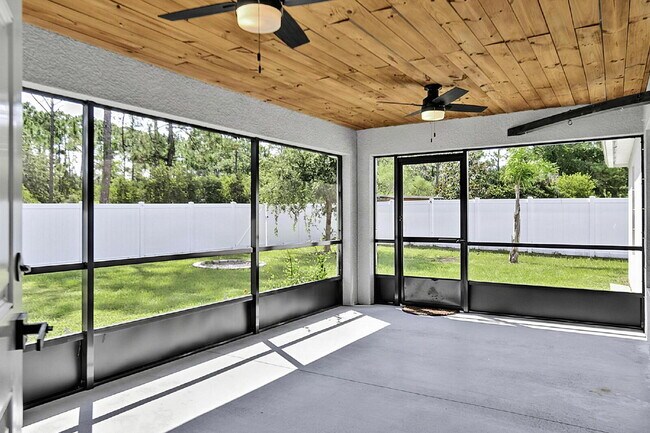 Building Photo - Modern 4-Bedroom, 3-Bath Home with Private In-Law Suite – Palm Coast, FL