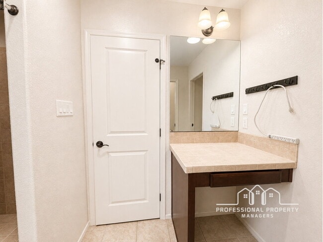 Building Photo - "Spacious 4-Bedroom, 2-Bathroom SOLAR Home in Mesa del Sol!"