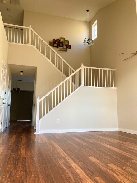 Living Room with vaulted Ceilings - 15949 Longford Dr