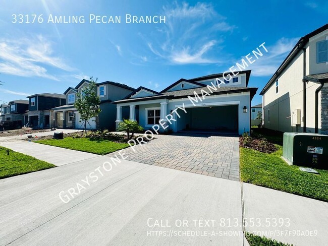 Building Photo - "Luxury Living in Wesley Chapel: Spacious ...