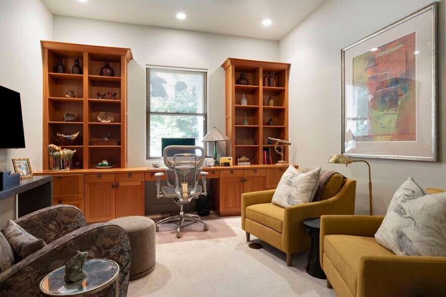 Designated home office space on the main level with built-ins to keep files organized - 745 Rice St E