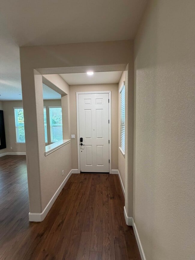 Building Photo - Solar Home with EV Garage Charging. 4 Bedroom Home with Downstairs Bedroom and Full Bathroom.