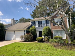 Building Photo - Beautiful fenced in Corner Lot!