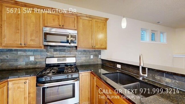 Building Photo - 5671 SW Remington Dr