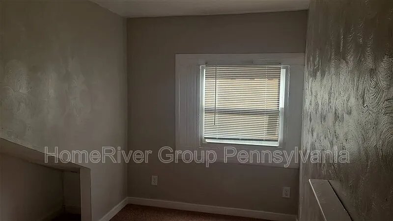 Building Photo - 6037 Poketa Rd