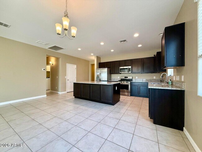 Building Photo - 40865 W Hensley Way