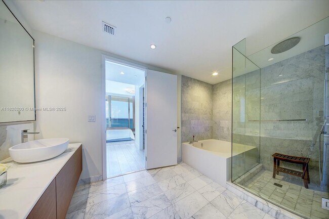 Building Photo - 10203 Collins Ave