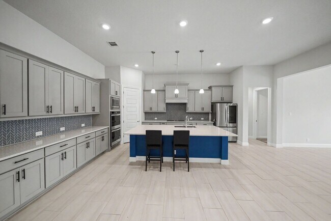 Building Photo - Stunning 4BR Home with 3-Car Garage in Turning Stone - Realtor Commission: $750