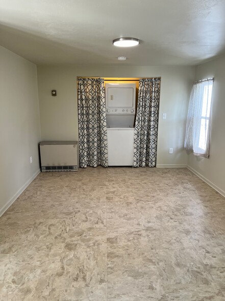 Livingroom with washer/dryer - 340 Dryden Harford Rd