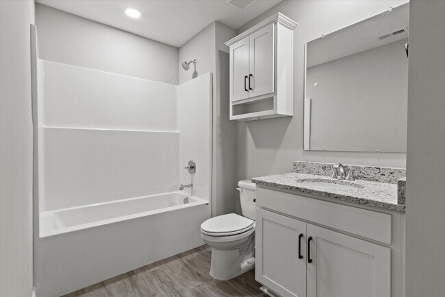 Building Photo - Stylish 4BR Townhome Living in the Heart o...