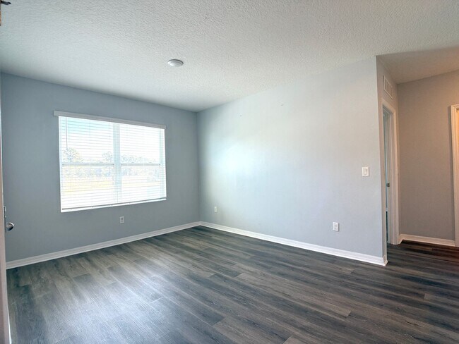 Building Photo - Move-In Ready • Lawn Care Included • Pet-Friendly!