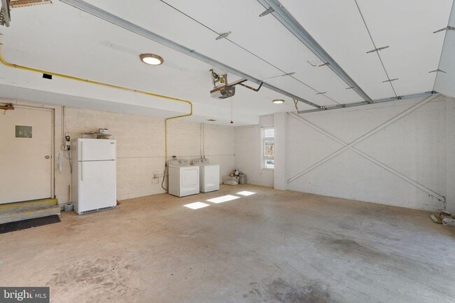 Building Photo - Welcome to this rarely available and beautifully updated ground-level condo offering the perfect ...