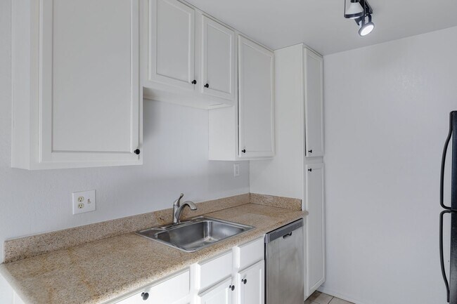 Building Photo - Welcome to Sunrise located in the Heart of...