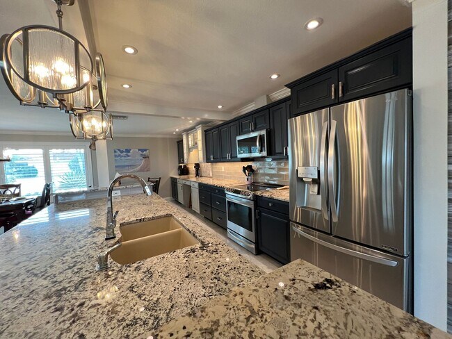 Building Photo - Furnished ** Punta Gorda Isles Vacation Home ** Heated Pool ** Canal / Boat Dock ** $7,500