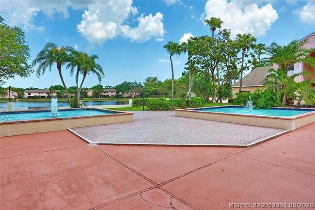 Building Photo - 3559 Cocoplum Cir