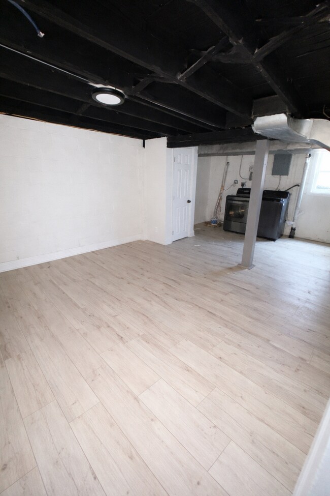 Building Photo - Renovated Home with Modern Kitchen, Basement & Natural Light